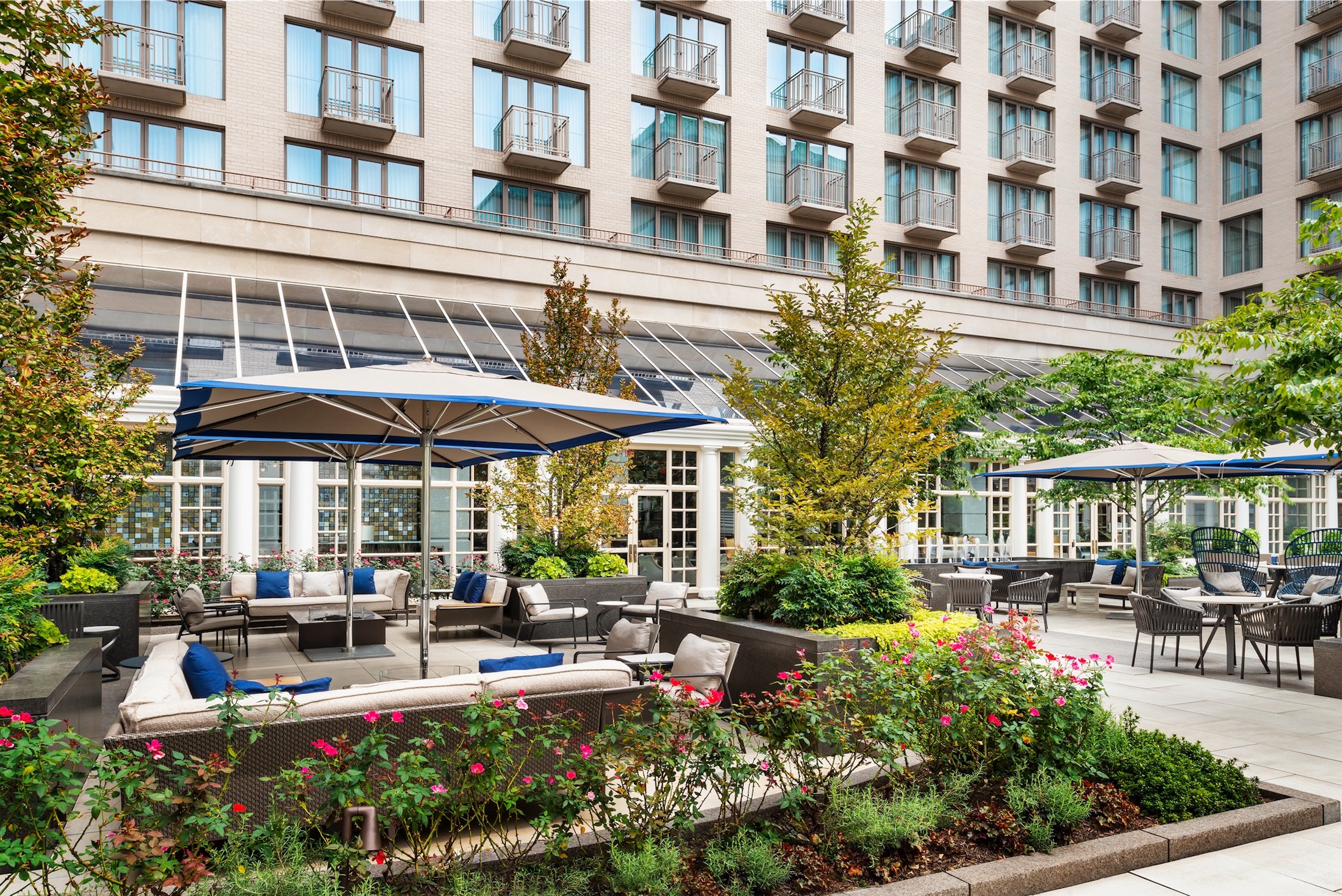 The outdoor bar and dining patio at Fairmont Washington D.C. Hotel.